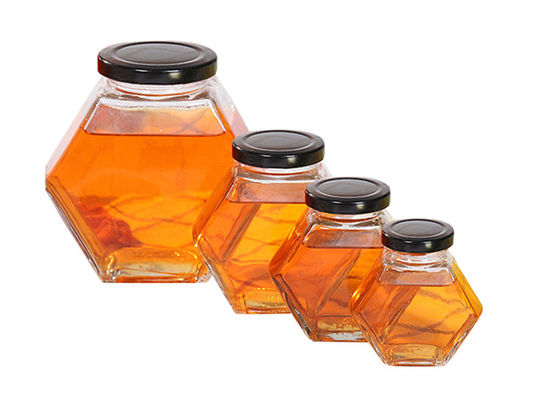 250ml-750mlふた、六角形ガラスが付いているガラス蜂蜜の瓶は明確な色を震動させる